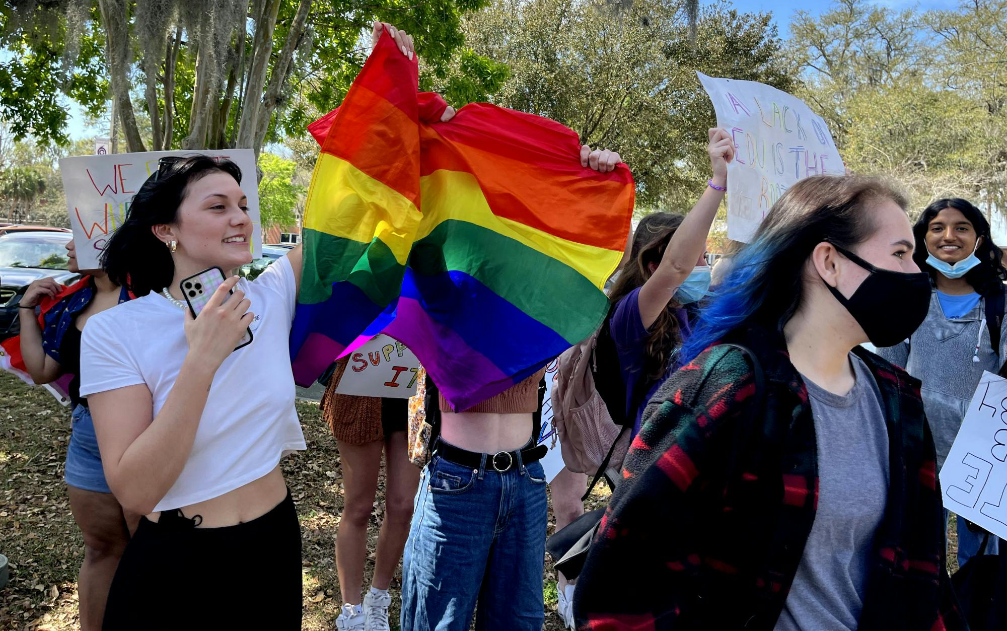 Gainesville High School students protest outside their school's campus, waving their flags for oncoming traffic in opposition to Florida's ‘Don’t Say Gay’ bill, which would effectively ban discussion of LGBTQ+ issues in elementary schools and stigmatize it in upper grade levels. 