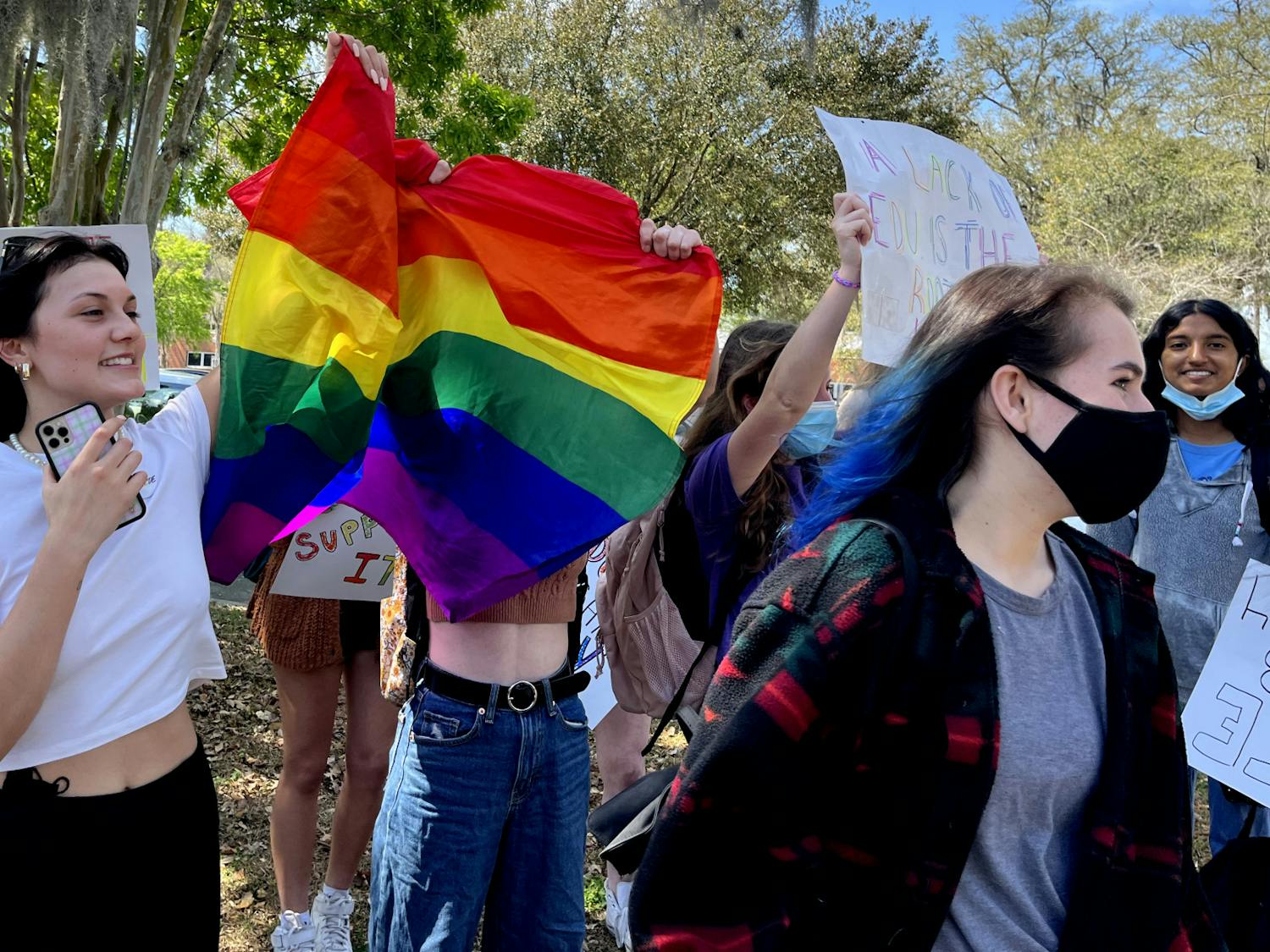 Gainesville High School students protest outside their school's campus, waving their flags for oncoming traffic in opposition to Florida's ‘Don’t Say Gay’ bill, which would effectively ban discussion of LGBTQ+ issues in elementary schools and stigmatize it in upper grade levels. 