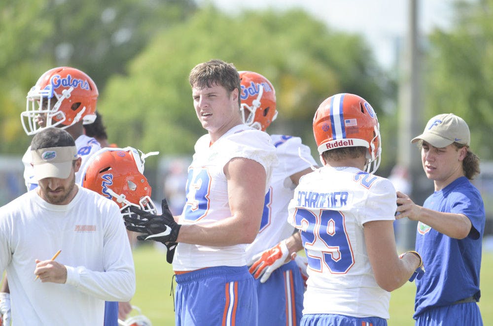 Tight end Jake McGee stands on the sideline during Spring practice on April 6 at Donald R. Dizney Stadium.