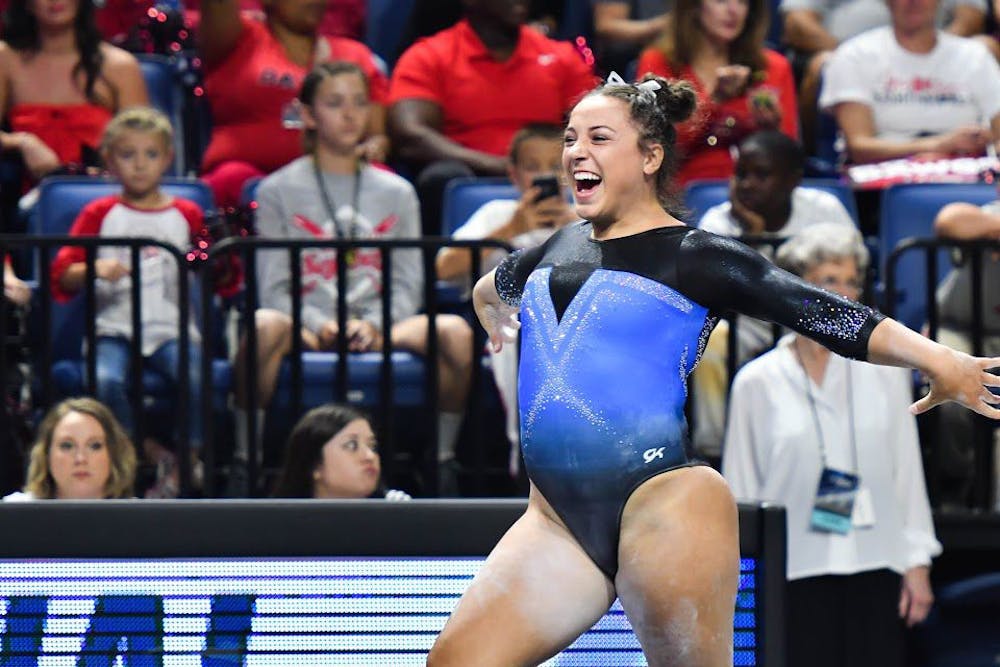 <p>UF gymnast Amelia Hundley performs a routine during the NCAA Gainesville Regional on April 1, 2017, in the O'Connell Center.</p>