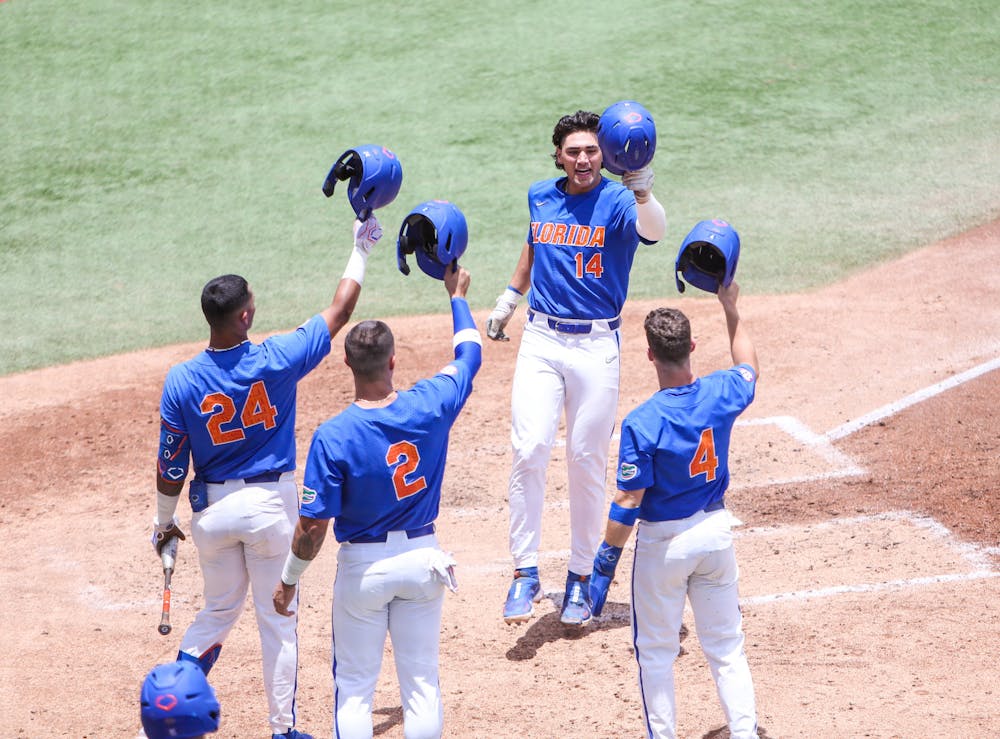 Gators' bats keep hope alive in College World Series finals - The