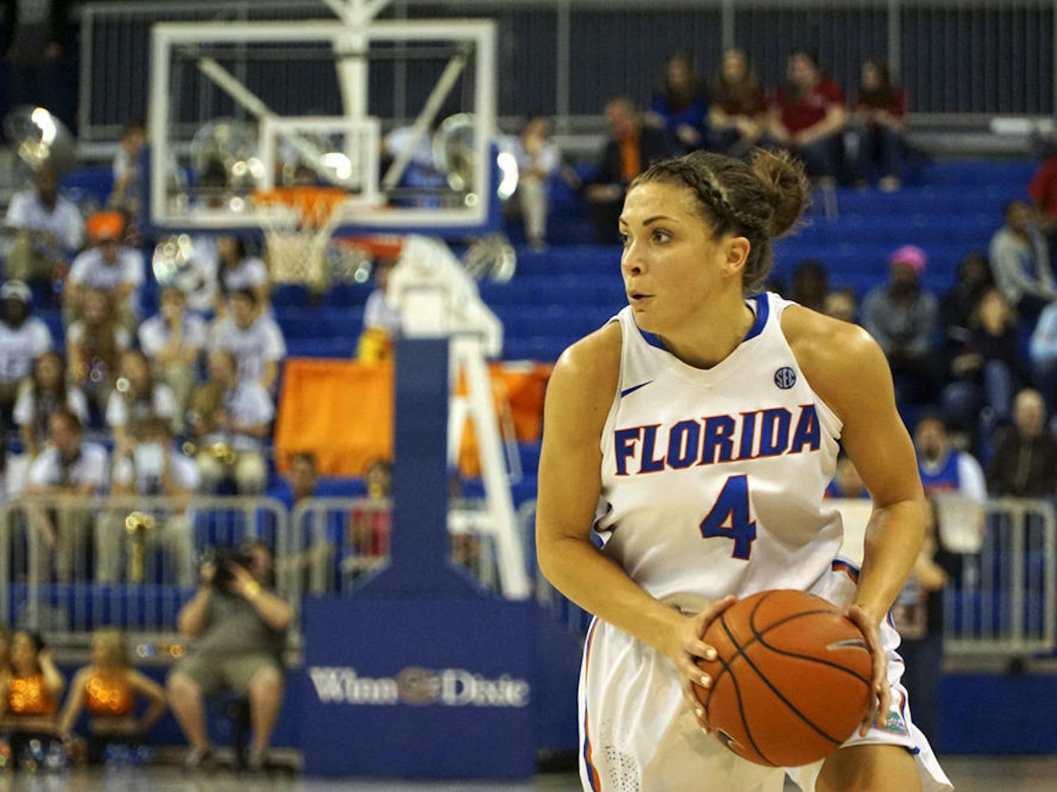UF's Carlie Needles looks to pass the ball during Florida's 85-79 win over Kentucky on Jan. 31, 2016, in the O'Connell Center.