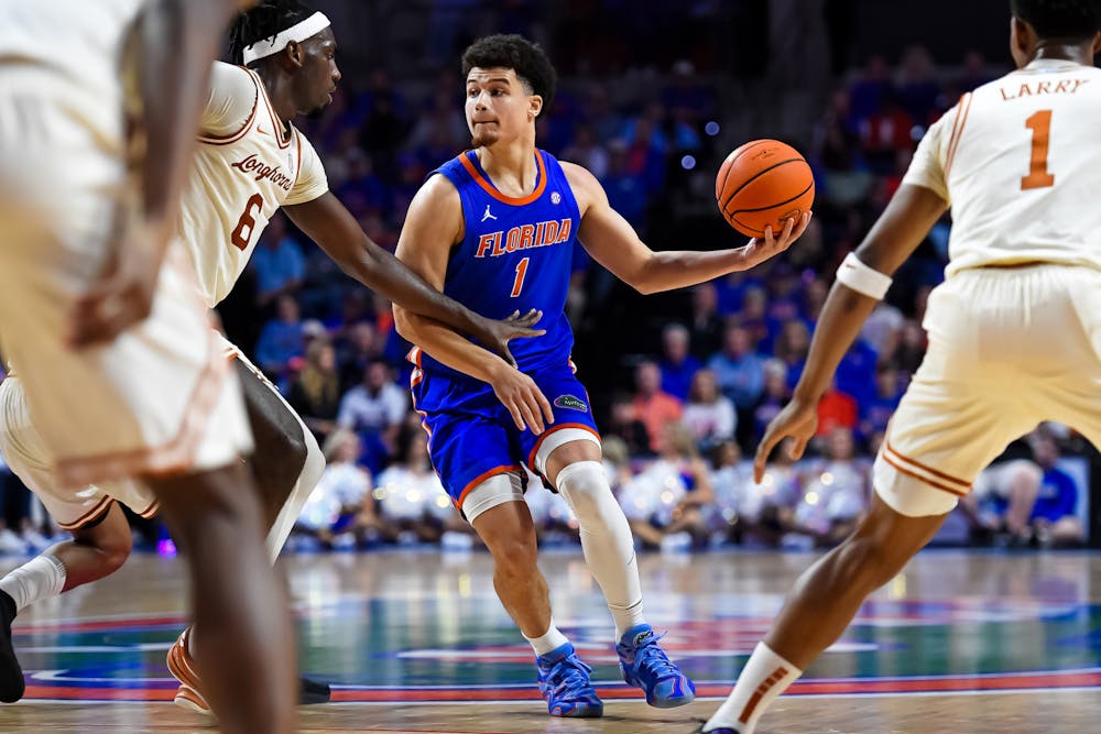 <p>Florida guard Walter Clayton Jr. (1) looks to pass as the Gators faced the Longhorns on Saturday, Jan. 18, 2025, at the O’Connell Center in Gainesville, Florida.</p>