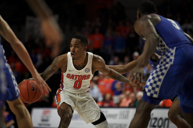 UF guard Kasey Hill dribbles the basketball during Florida's 88-66 win over Kentucky on Feb. 5, 2017, in the O'Connell Center.