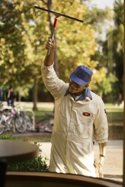 The removal process of the 15 "Crossing Paths" on-campus statues will begin today, including Seward Johnson's "Nice to See You," which can be seen from inside Einstein Bros. Bagels in the Hub.