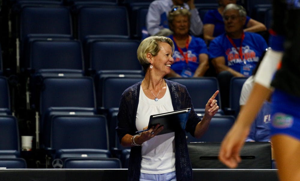 UF coach Mary Wise smiles during Florida's 3-0 win against Florida A&M on Sept. 15, 2017, in the O'Connell Center.