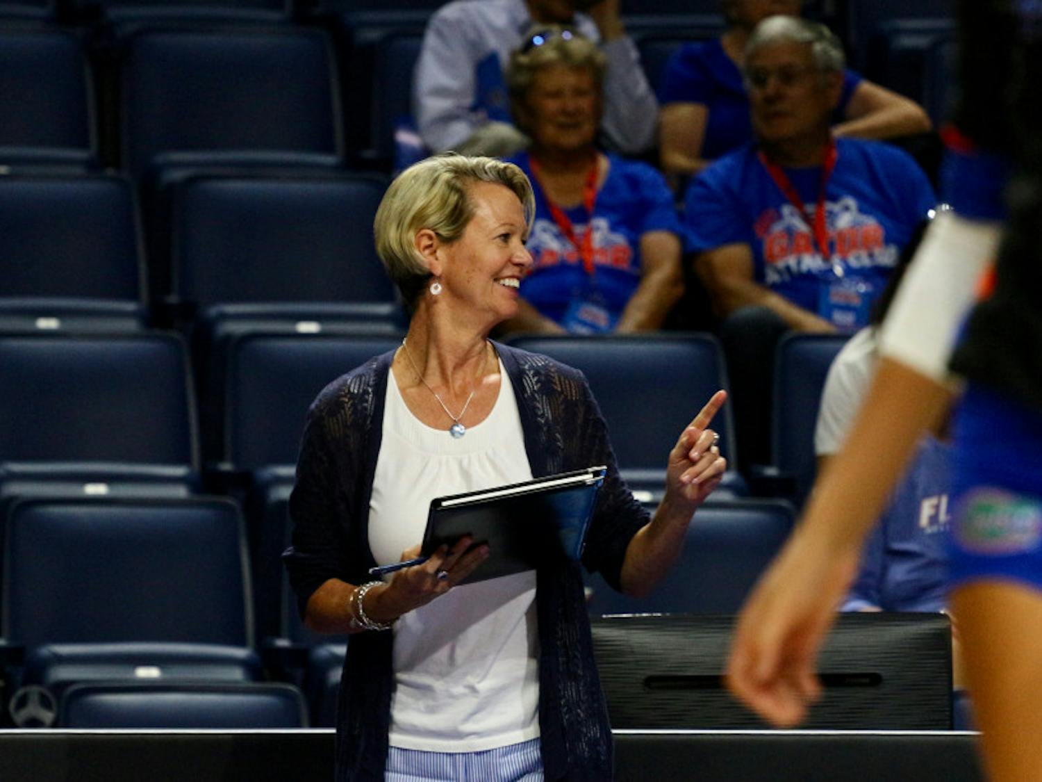 UF coach Mary Wise smiles during Florida's 3-0 win against Florida A&M on Sept. 15, 2017, in the O'Connell Center.