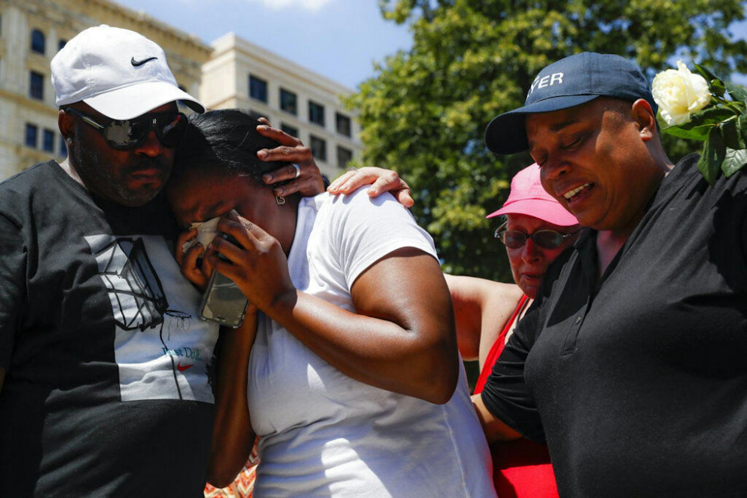 Mourners gather at a vigil following a nearby mass shooting, Sunday, Aug. 4, 2019, in Dayton, Ohio. Multiple people in Ohio have been killed in the second mass shooting in the U.S. in less than 24 hours, and the suspected shooter is also deceased, police said.&nbsp;