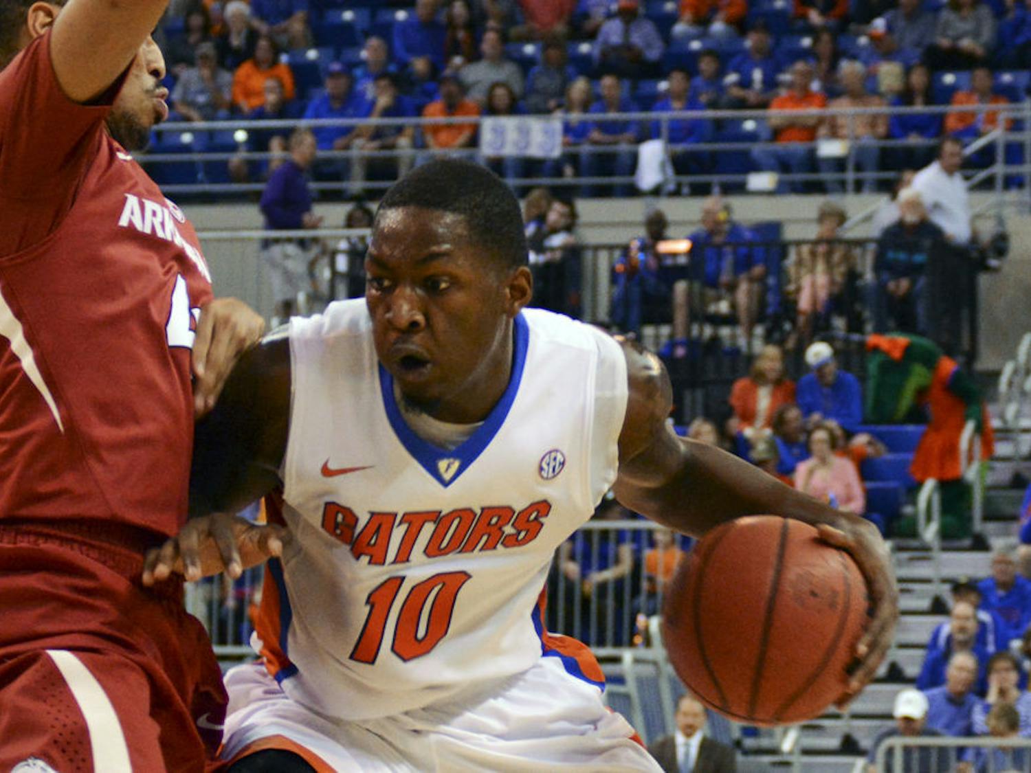 Dorian Finney-Smith drives into the paint during Florida's 57-56 win against Arkansas on Saturday in the O'Connell Center.