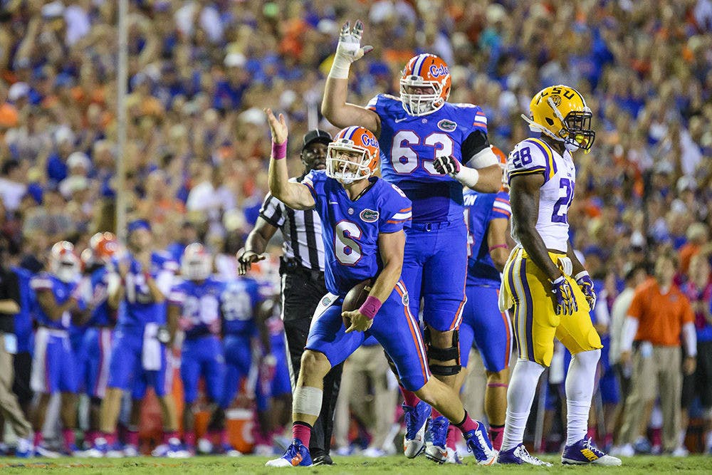 <p>Jeff Driskel (6) reacts after rushing for a first down during Florida's 30-27 loss to LSU on Saturday at Ben Hill Griffin Stadium.</p>