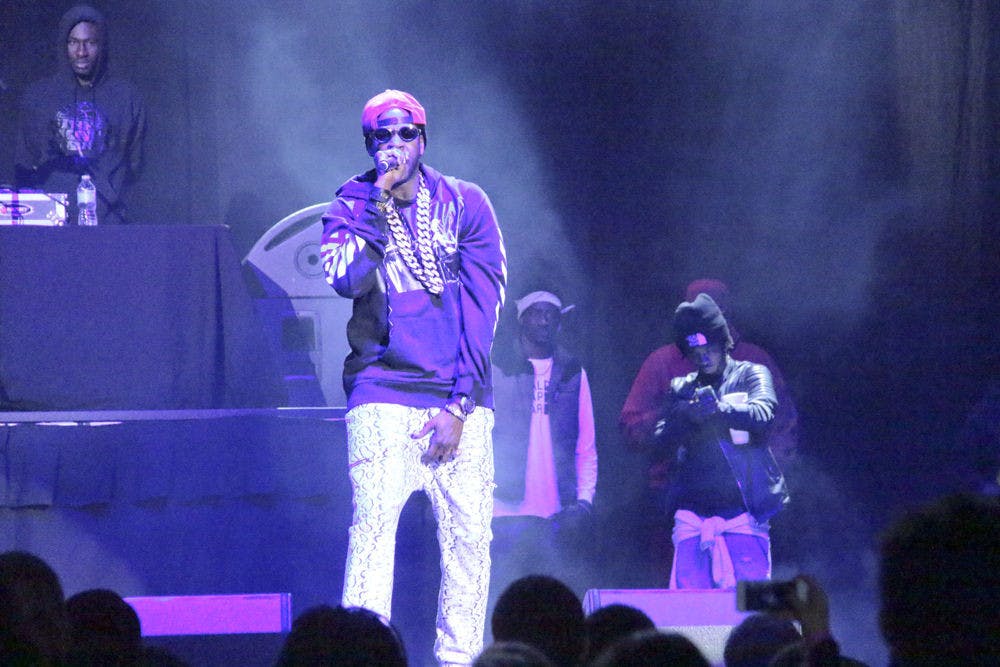 Rapper 2 Chainz performs on stage at the Stephen C. O’Connell Center on Thursday night. 2 Chainz, along with rapper Action Bronson, were brought to UF by Student Government Productions.