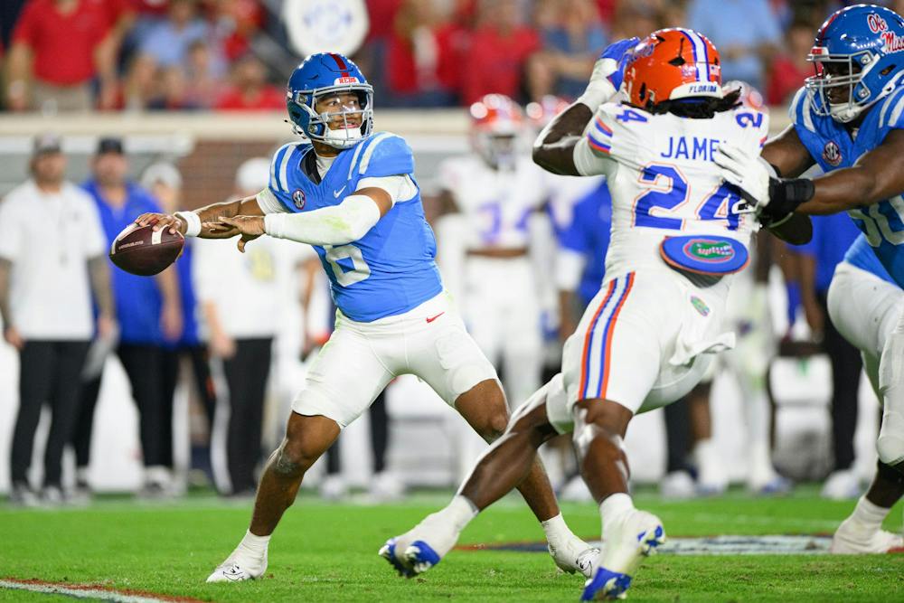 Ole Miss Rebels quarterback Trinidad Chambliss (6) throws the ball during an NCAA college football game, Saturday, Nov. 15, 2025, in Oxford, Miss.