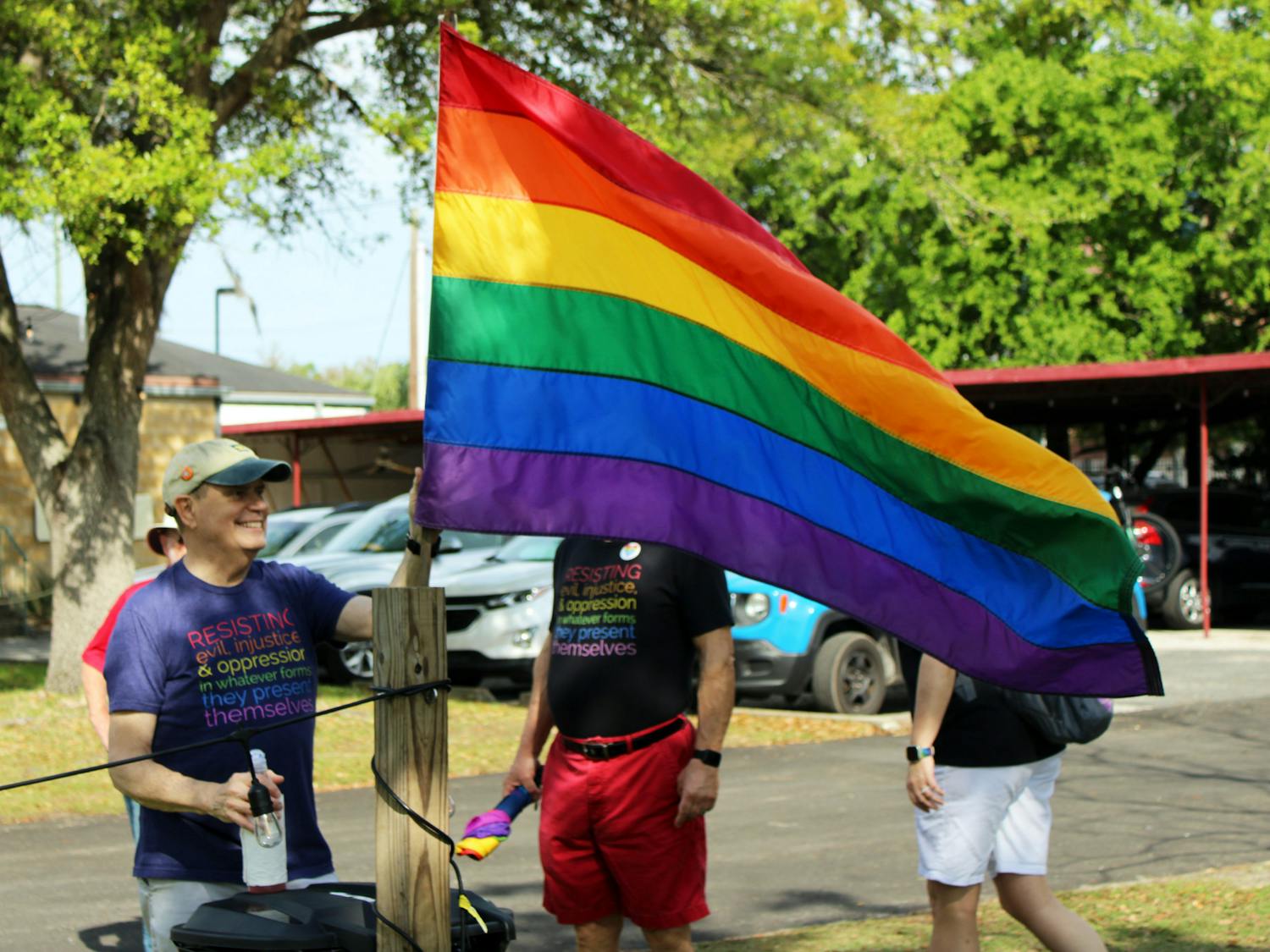 Gainesville community members gather at Heartwood Soundstage in protest of Florida’s Don’t Say Gay bill Saturday, March 19, 2022. 