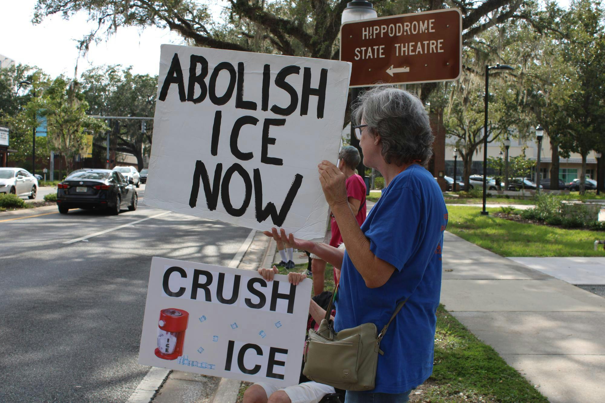 Gainesville residents gather at Gainesville City Hall for a protest and vigil honoring victims of ICE and police violence, Saturday, July 25, 2026.