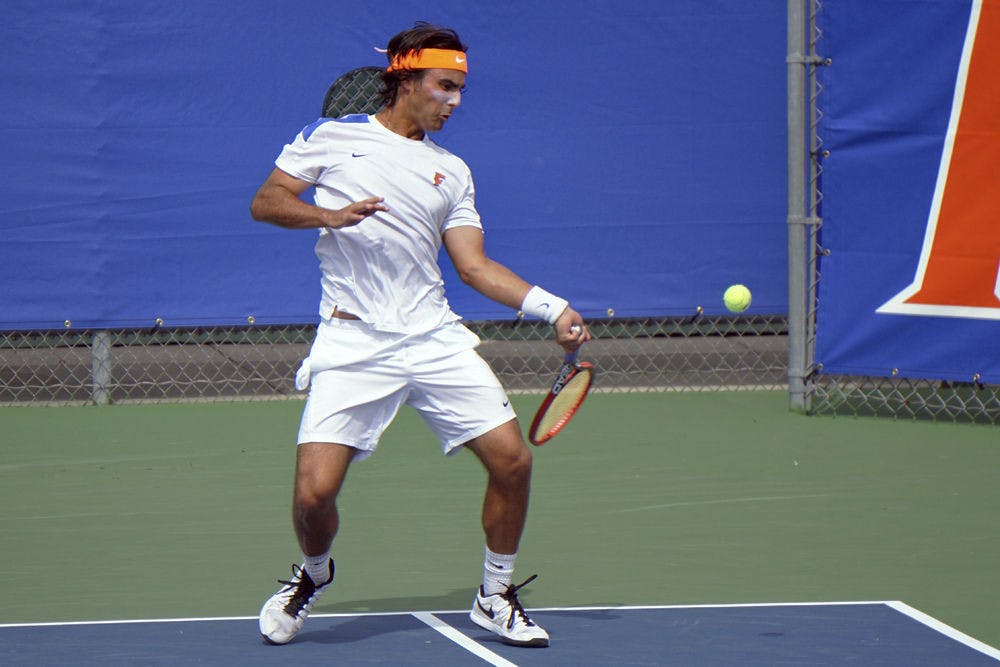 <p>UF senior Diego Hidalgo hits an open-stance forehand during the singles semifinals of the USTA/ITA Southeast Regional Championships on Oct. 18, 2015, at the Ring Tennis Complex</p>