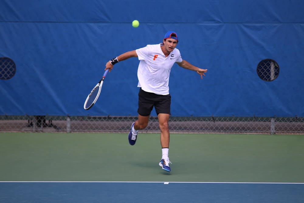 <p>Senior captain Duarte Vale returns a ball against Auburn on Feb. 21, 2021. Vale along with doubles partner Nate Bonetto defeated the Kentucky pairing of Francois Musitelli and Yasha Zeme. Their victory contributed to Florida&#x27;s team win over the Wildcats Sunday. </p>