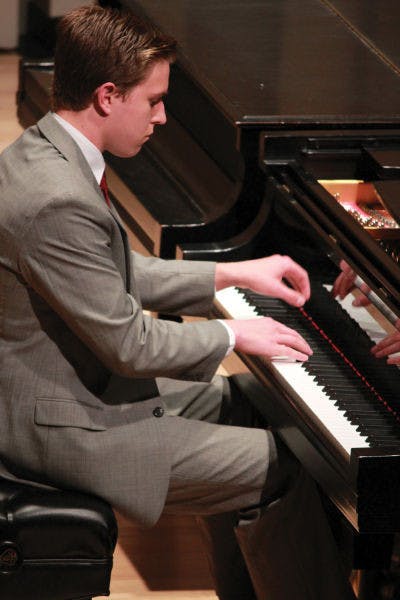 Southern Oregon University student Nic Temple, 19, performs “Transcendental” Etude No. 7, “Eroica” at the 2013 UF International Piano Festival on Monday.
&nbsp;