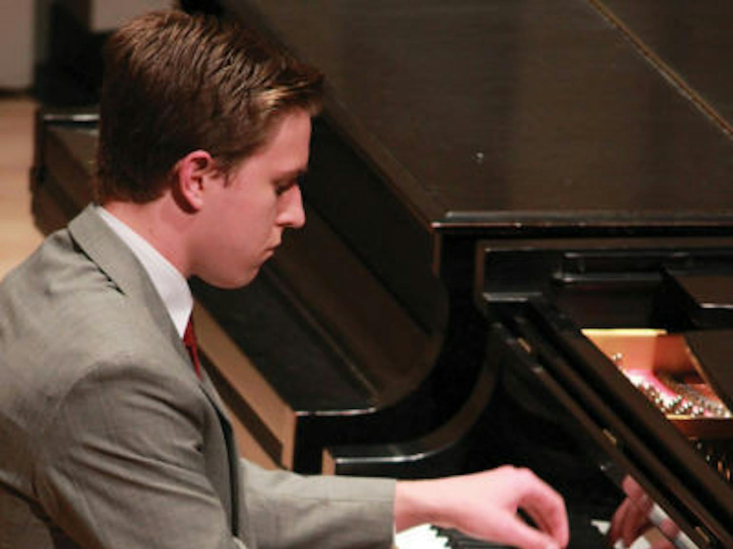 Southern Oregon University student Nic Temple, 19, performs “Transcendental” Etude No. 7, “Eroica” at the 2013 UF International Piano Festival on Monday.
&nbsp;