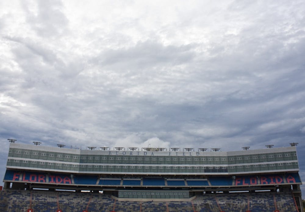 <p>Clouds hover above Ben Hill Griffin Stadium on a gloomy day Thursday.</p>