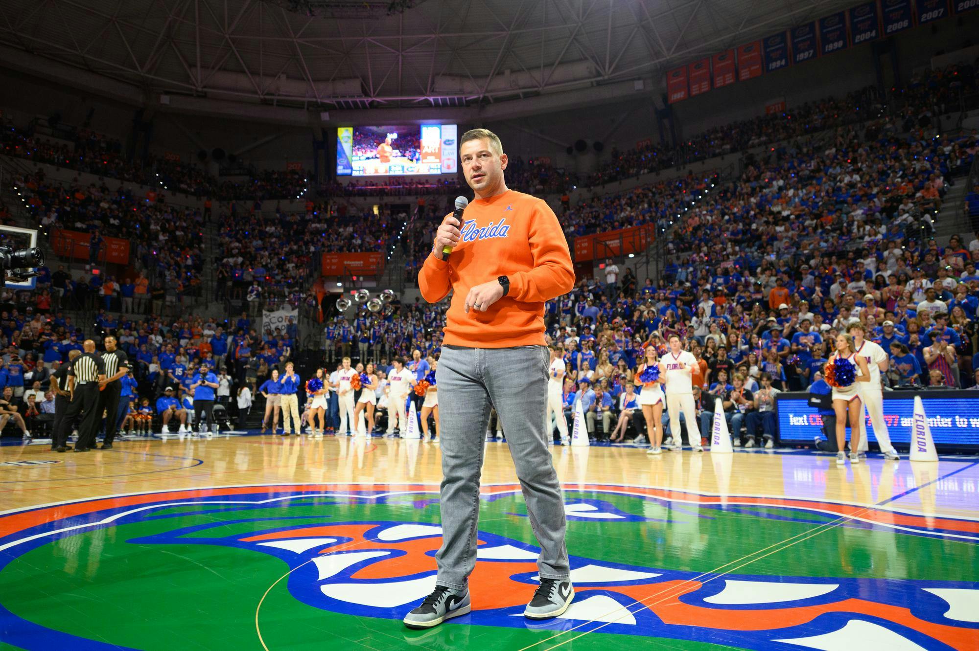 Florida head football coach Jon Sumrall speaks to a crowd of over 11,000 fans during a timeout in an NCAA men’s basketball game between Florida and Auburn in Gainesville, Fla., Saturday, Jan. 24, 2026.