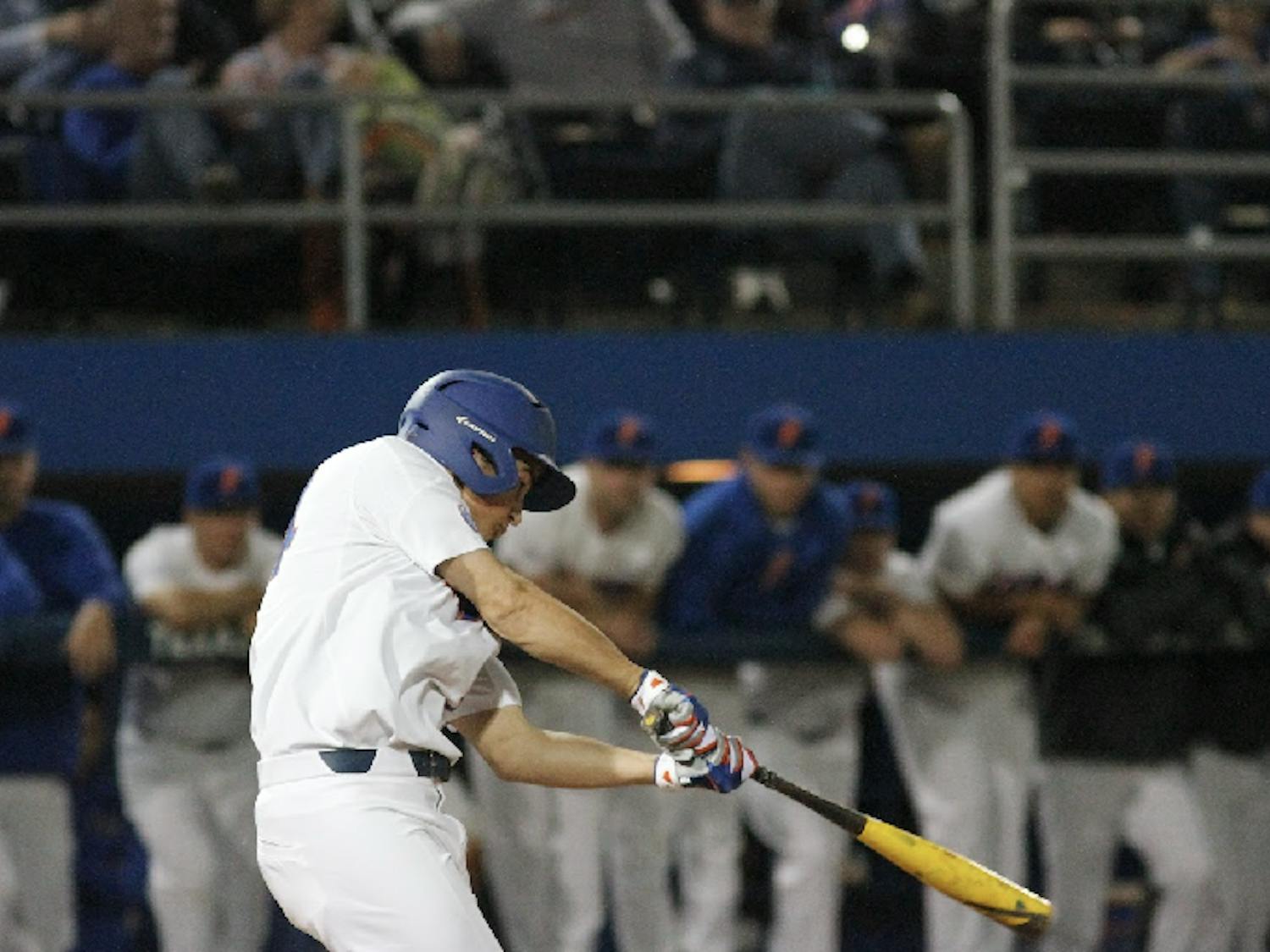 UF outfielder Austin Langworthy connects with a pitch during Florida's 8-1 win over William & Mary on Feb. 18, 2017, at McKethan Stadium.