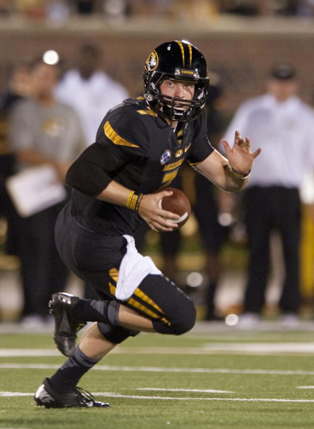 <p>Missouri quarterback Maty Mauk looks for a receiver during the fourth quarter his team's 58-14 win against Murray State in Columbia, Mo., on Aug. 31.</p>