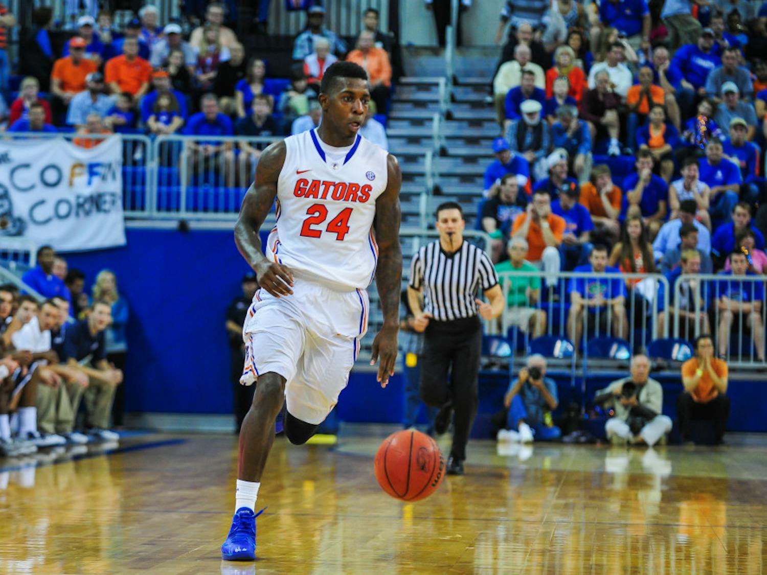 Senior forward Casey Prather dribbles down the court during No. 10 Florida's 77-69 win against North Florida on Friday in the O'Connell Center. Prather scored 28 points and grabbed eight rebounds Friday.