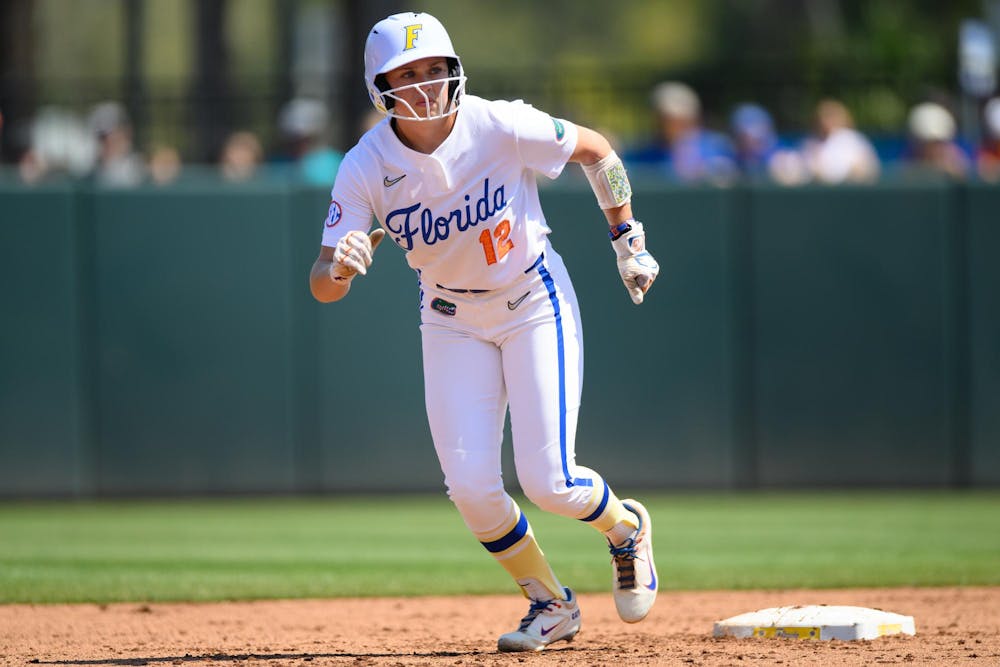 Florida infielder Kendall Grover (12) leaves second base during an NCAA softball game against Tennessee, Saturday, March 21, 2026, in Gainesville, Fla.