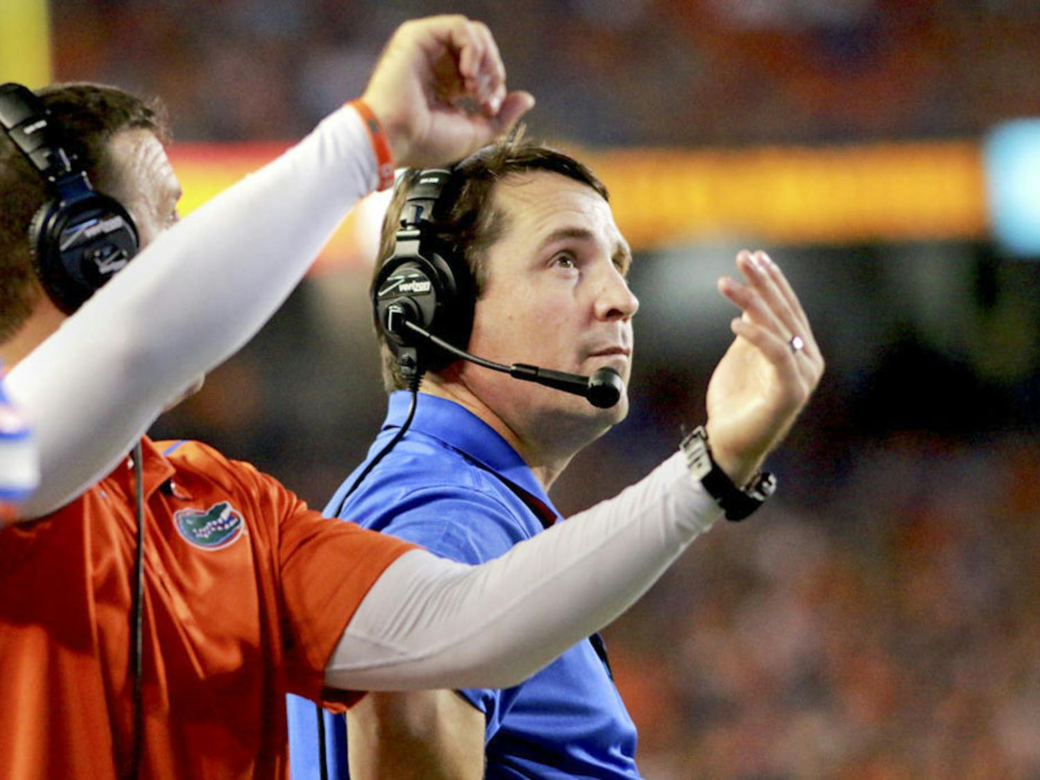 Florida head coach Will Muschamp glances at the scoreboard during Florida's 30-27 loss to LSU on Saturday at Ben Hill Griffin Stadium.