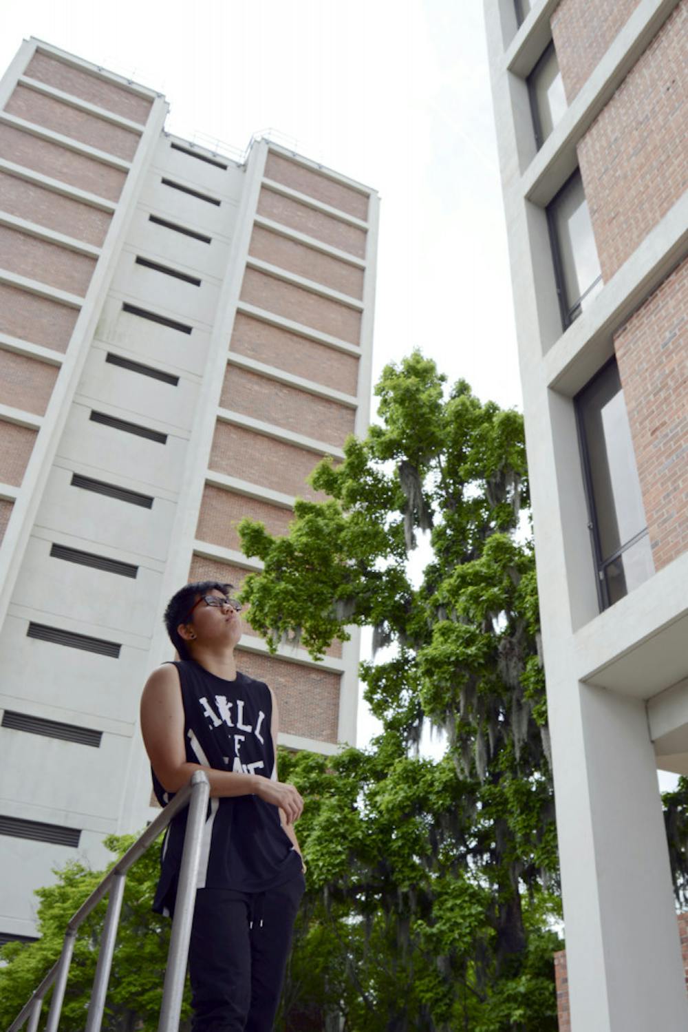 <p>May Niu, a 21-year-old UF industrial and systems engineering junior, poses for a photo in between the Beaty Towers on Sunday. A member of the pilot class of the Innovation Academy, Niu was not able to run for president of the Chinese American Student Association last fall because she would not be enrolled as a full-time student until spring.</p>