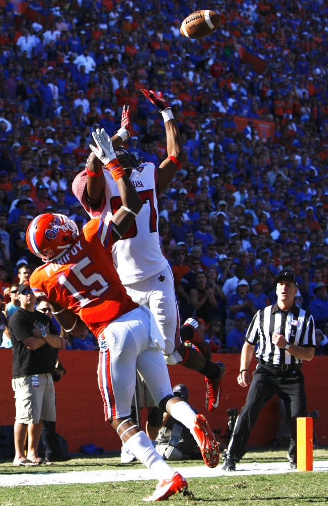 Defensive back Loucheiz Purifoy blocks a pass on Saturday at Ben Hill Griffin Stadium. His block punt led to a Jelani Jenkins recovery for a touchdown. Florida Beat Louisiana 27-20. 
