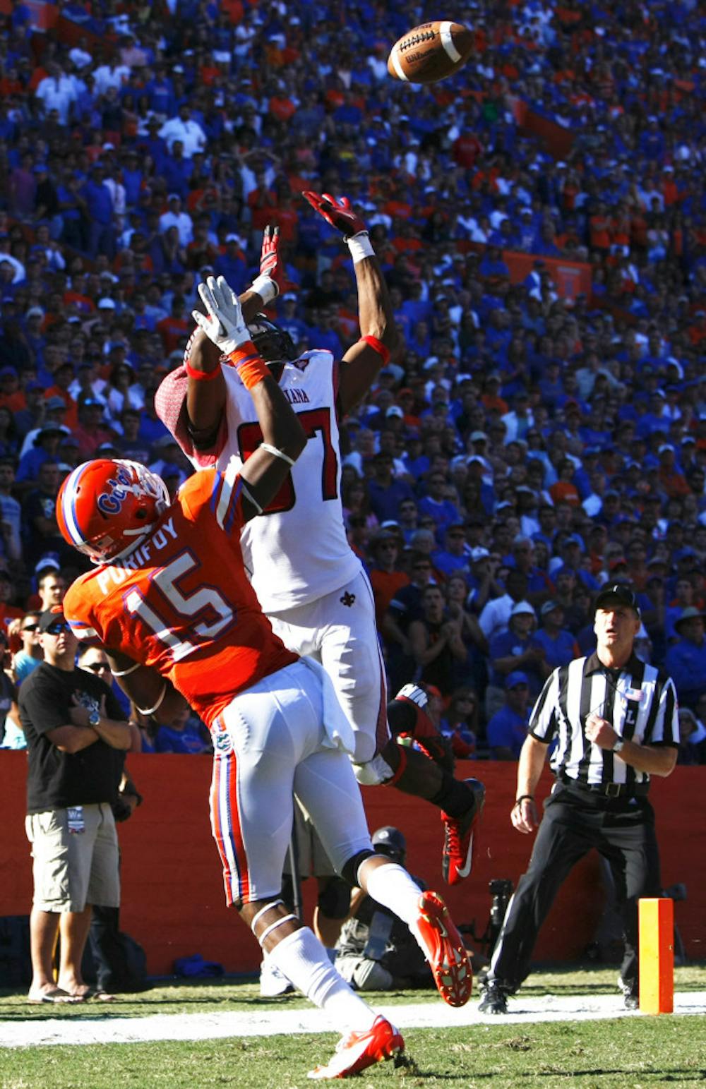 <p>Defensive back Loucheiz Purifoy blocks a pass on Saturday at Ben Hill Griffin Stadium. His block punt led to a Jelani Jenkins recovery for a touchdown. Florida Beat Louisiana 27-20. </p>