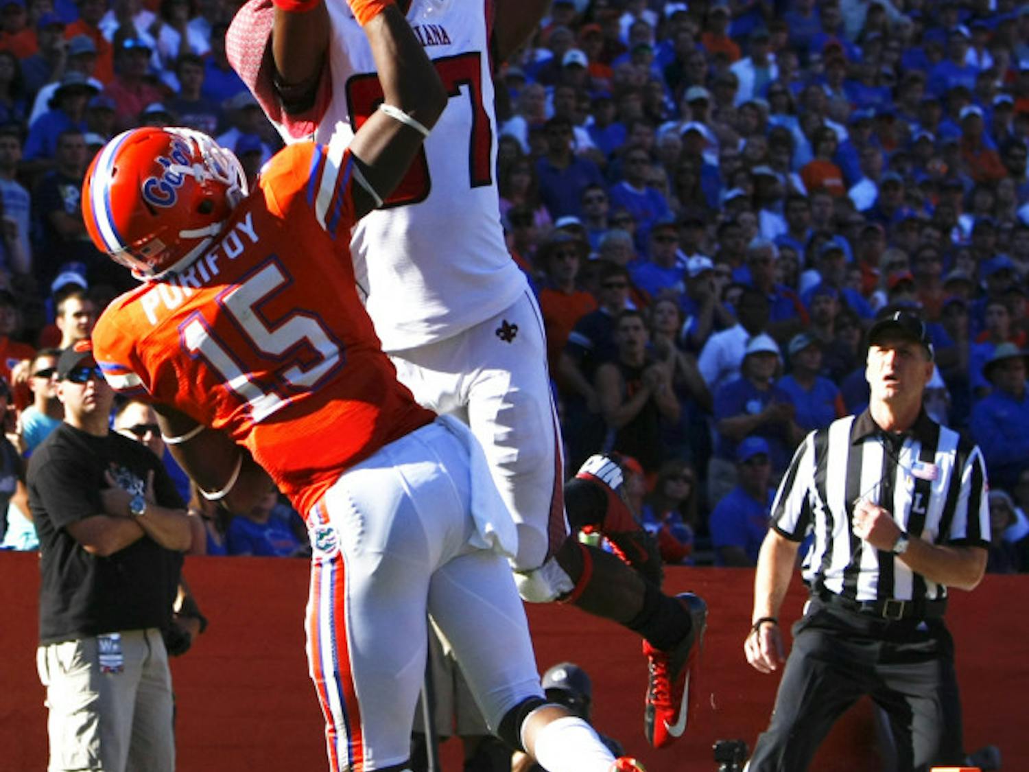 Defensive back Loucheiz Purifoy blocks a pass on Saturday at Ben Hill Griffin Stadium. His block punt led to a Jelani Jenkins recovery for a touchdown. Florida Beat Louisiana 27-20.