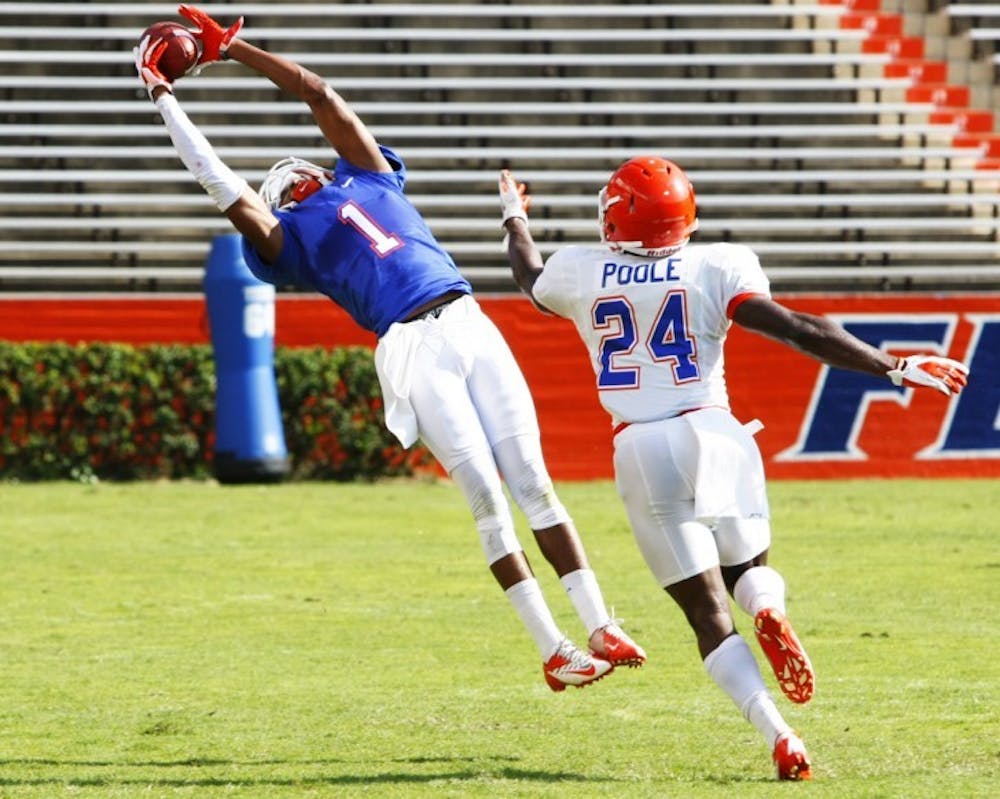 <p>Florida wide receiver Quinton Dunbar makes a leaping catch during the teamís open practice Saturday. Dunbar caught just 14 passes in 2011.</p>