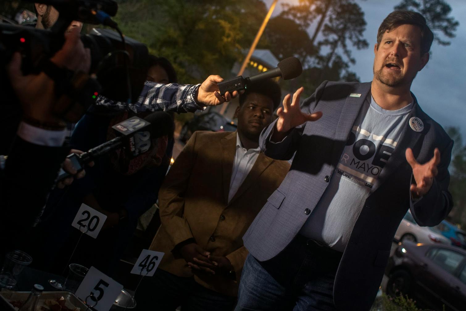 Lauren Poe speaks to a crowd of reporters and about 100 supporters March 20, 2019 at the Public and General restaurant after elections. Poe beat three opponents to win his second term as mayor of Gainesville. 