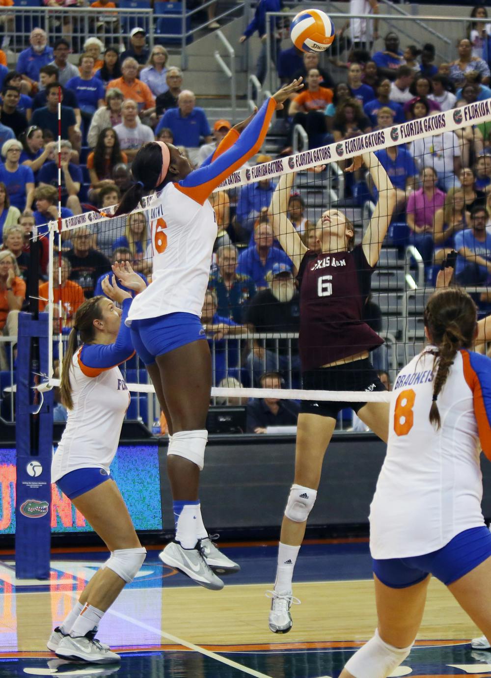 <p>Redshirt sophomore middle blocker Simone Antwi (16) blocks the ball during Florida’s 3-0 victory against Texas A&amp;M on Oct. 4 in the O’Connell Center.</p>