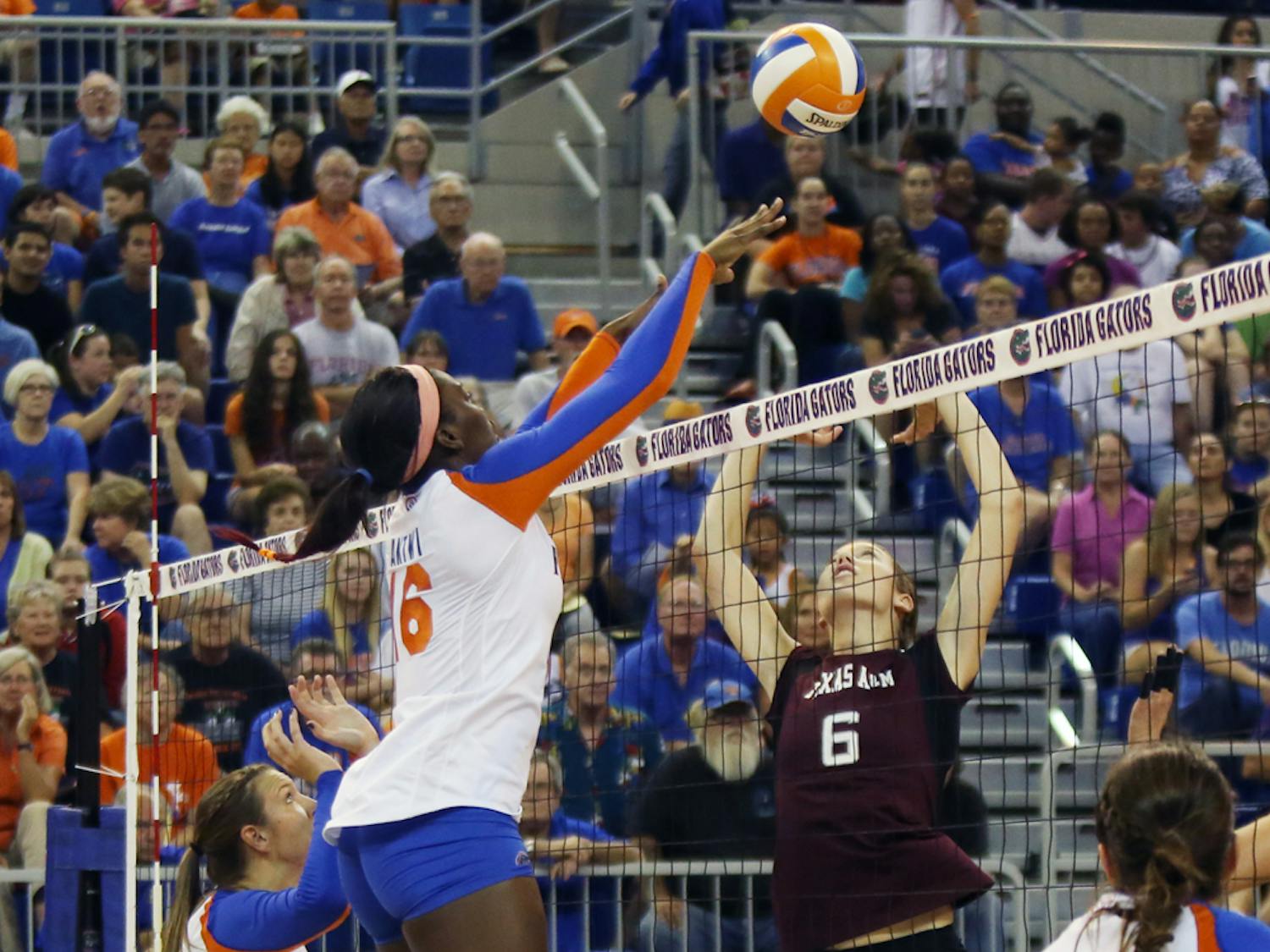 Redshirt sophomore middle blocker Simone Antwi (16) blocks the ball during Florida’s 3-0 victory against Texas A&amp;M on Oct. 4 in the O’Connell Center.