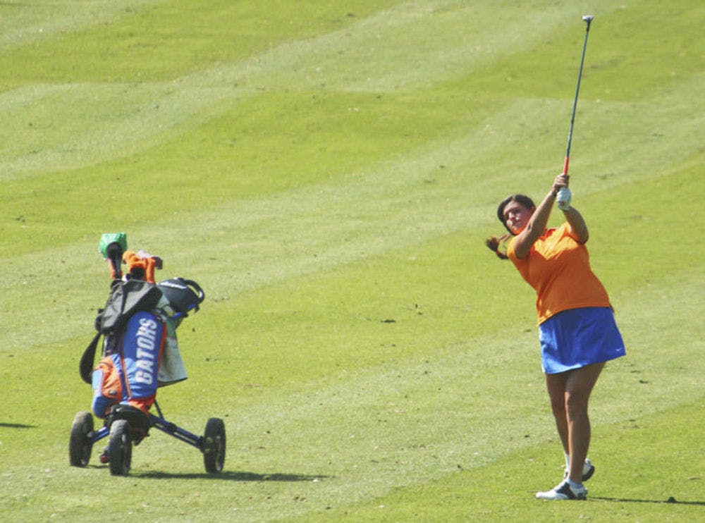 <p>Maria Torres hits the ball during the SunTrust Gator Women's Golf Invitational on March 15.</p>