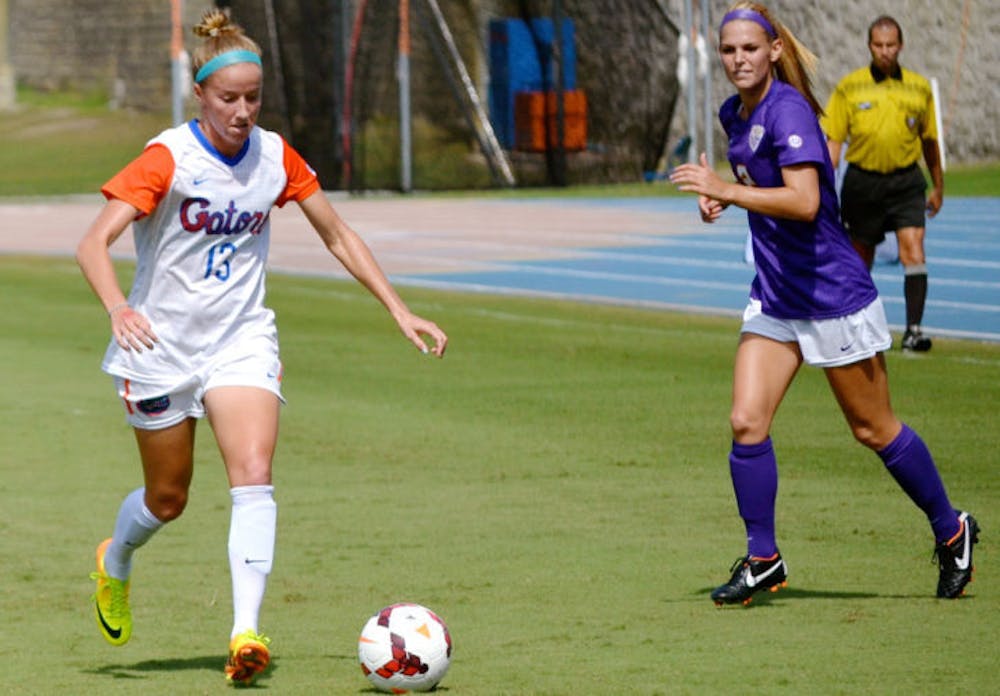 <p>Annie Speese dribbles the ball during Florida’s 3-0 victory against LSU on Sunday afternoon at James G. Pressly Stadium. The junior midfielder scored from a free kick during the 62nd minute — her first goal of the 2013 season.</p>