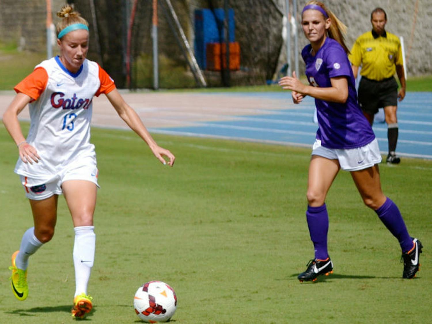Annie Speese dribbles the ball during Florida’s 3-0 victory against LSU on Sunday afternoon at James G. Pressly Stadium. The junior midfielder scored from a free kick during the 62nd minute — her first goal of the 2013 season.