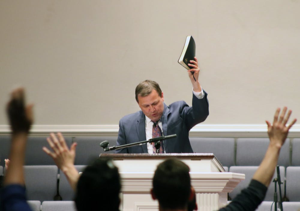 Jimmy Toney, the 45-year-old pastor of The Pentecostals of Gainesville, leads a vigil for the victims of the I-75 accident last Thursday. People filled the church Sunday evening to support the families of the victims and pray for their recovery. “They’ve been stuck in hospitals with doom and gloom and death,” Toney said. “I just think it meant the world.” // Chris Day, The Alligator