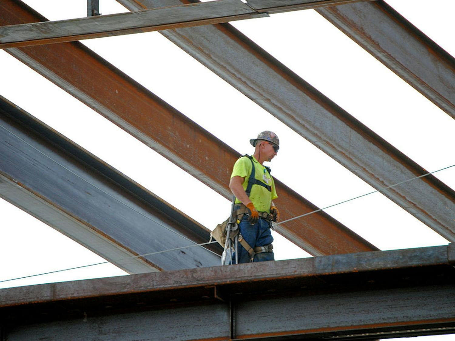 A construction worker stands at the site of the Reitz Union on Wednesday. Renovations are scheduled to be completed in late 2015.