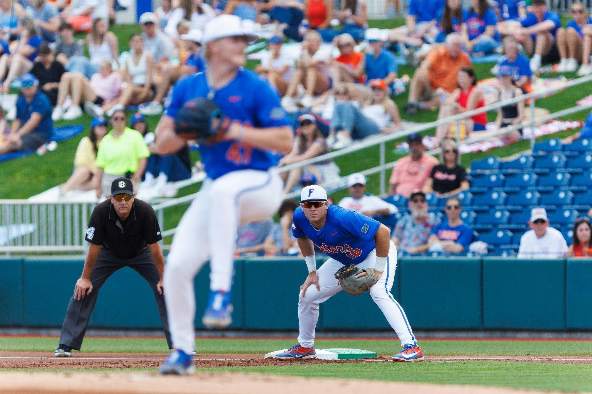 Florida Gators infielder Ethan Surowiec watches Florida Gators right handed pitcher Aidan King pitch during an NCAA Baseball game against High Point, Saturday, March 7, 2026, in Gainesville, Fla.