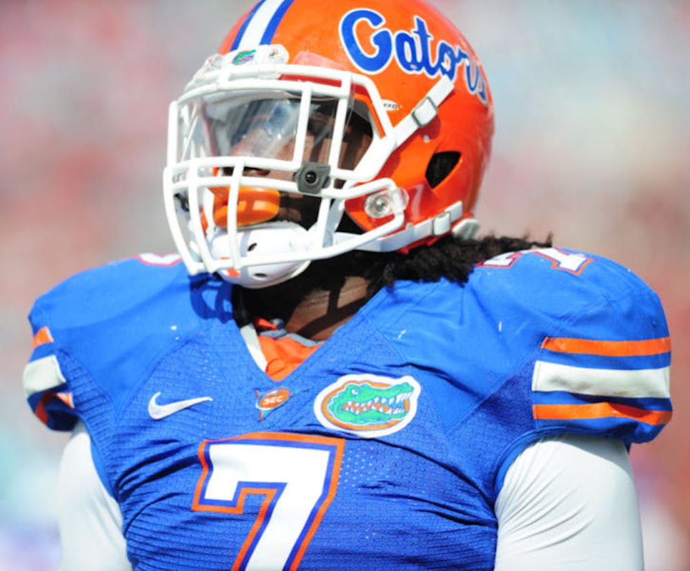 <p>Ronald Powell prepares on the field before Florida’s game against Georgia on Oct. 29, 2011. Powell will likely play in his first game since 2011 when Florida plays Toledo on Aug. 31.</p>