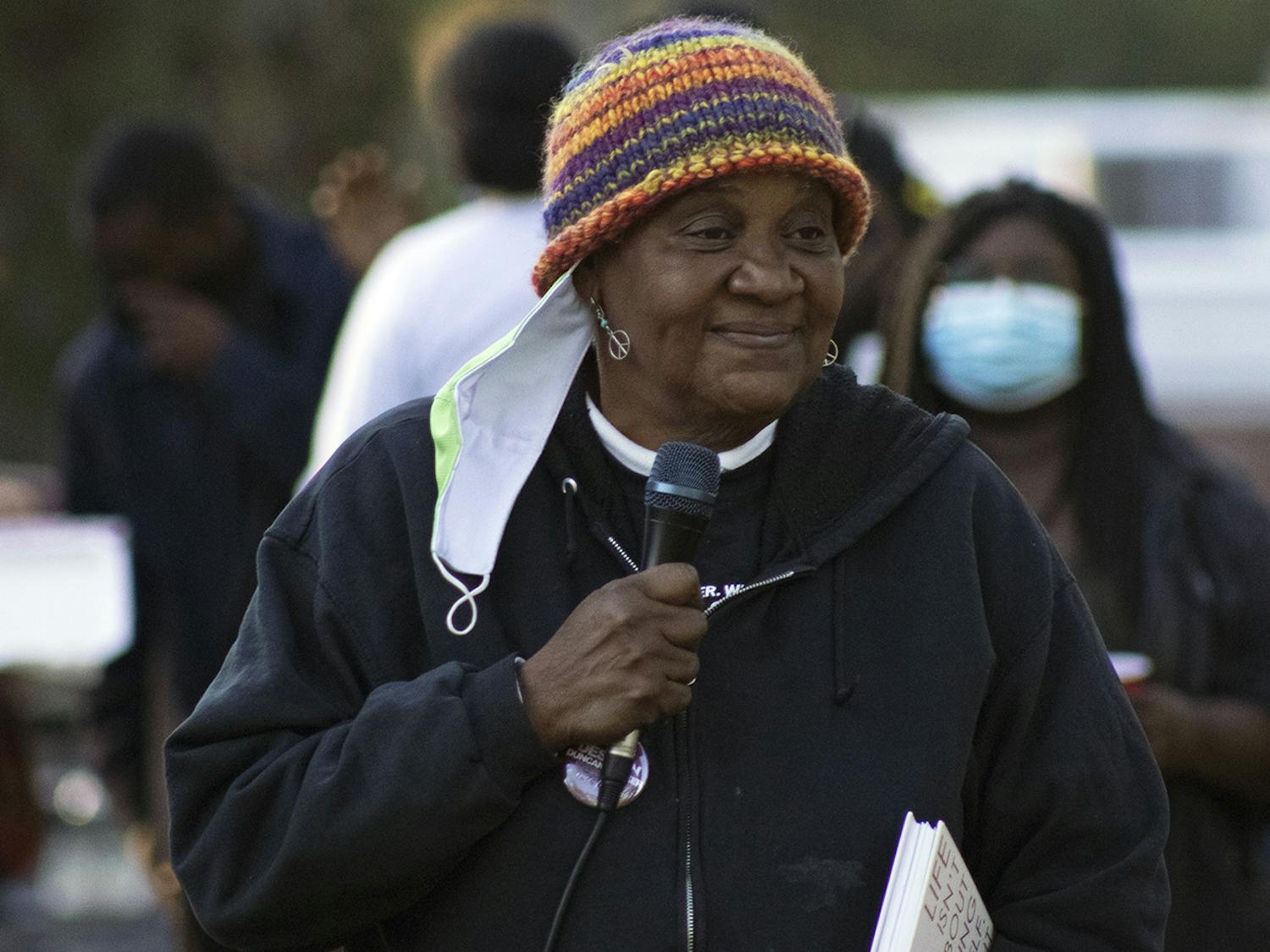 Faye Williams, owner of M.A.M.A.’s Club, speaks at a community gathering organized by GoDDsville Dream Defenders on Friday, April 2, 2021. Williams spoke about an upcoming fundraiser for MAMA’s Club and social issues affecting Gainesville.