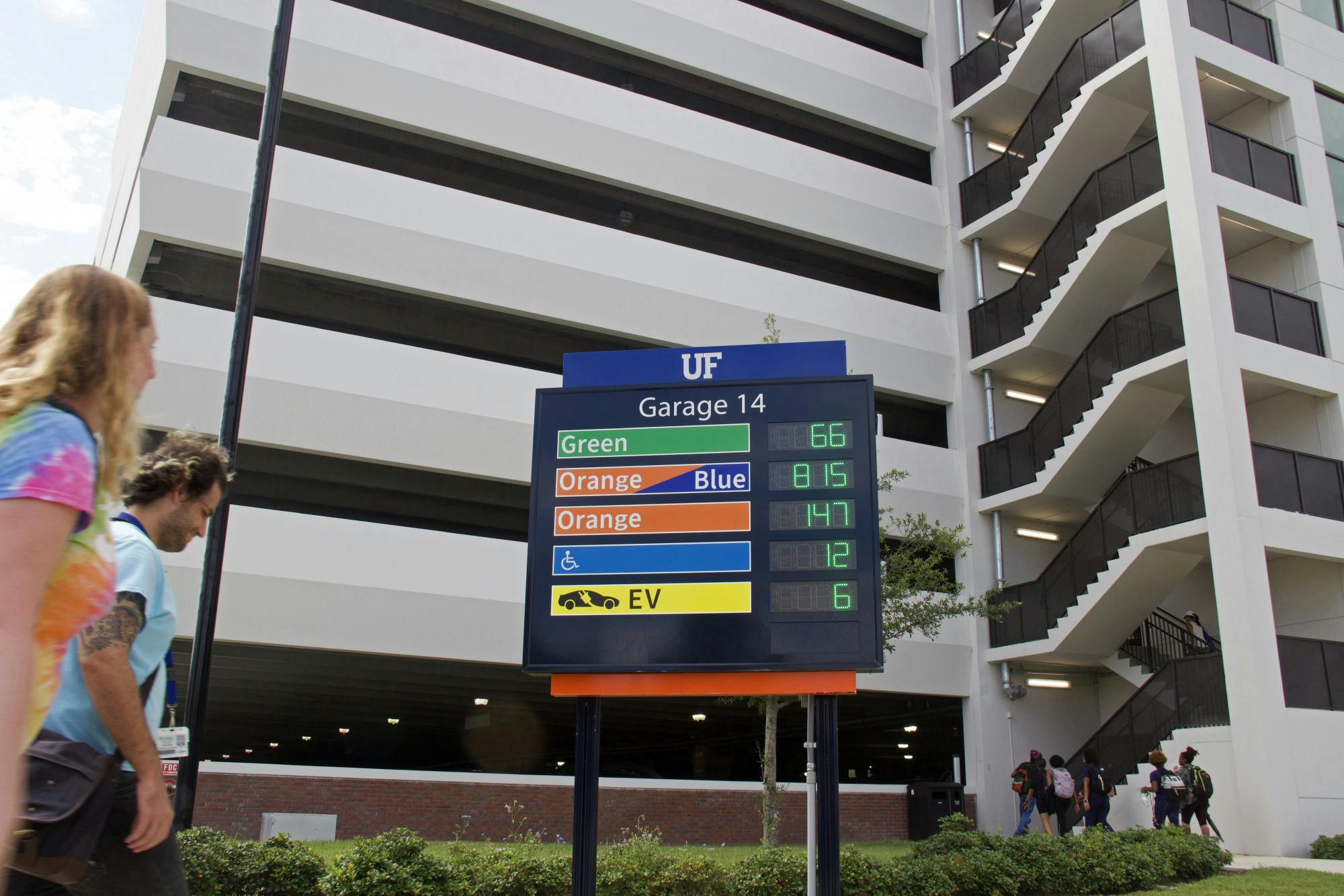 Students pass Garage 14 on Gale Lemerand Drive on Thursday, Sept. 2, 2021. 