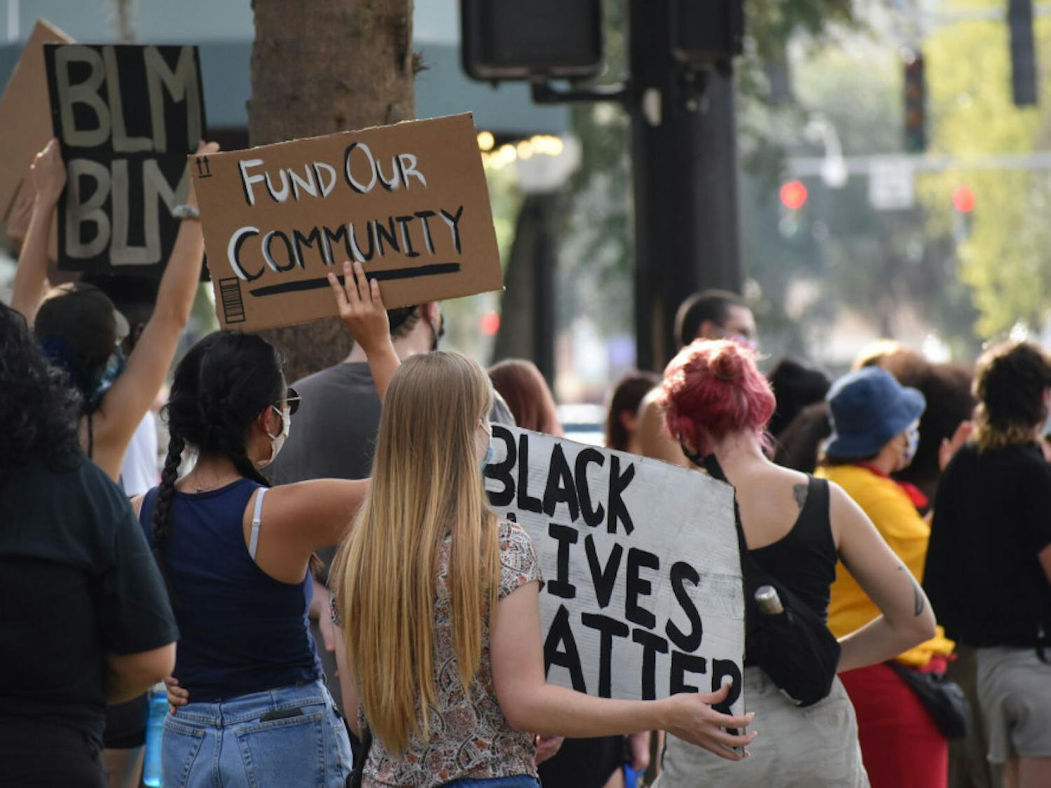 Protesters faced University Avenue and chanted “No justice, no peace. Defund the police.” to Gainesville’s evening traffic.