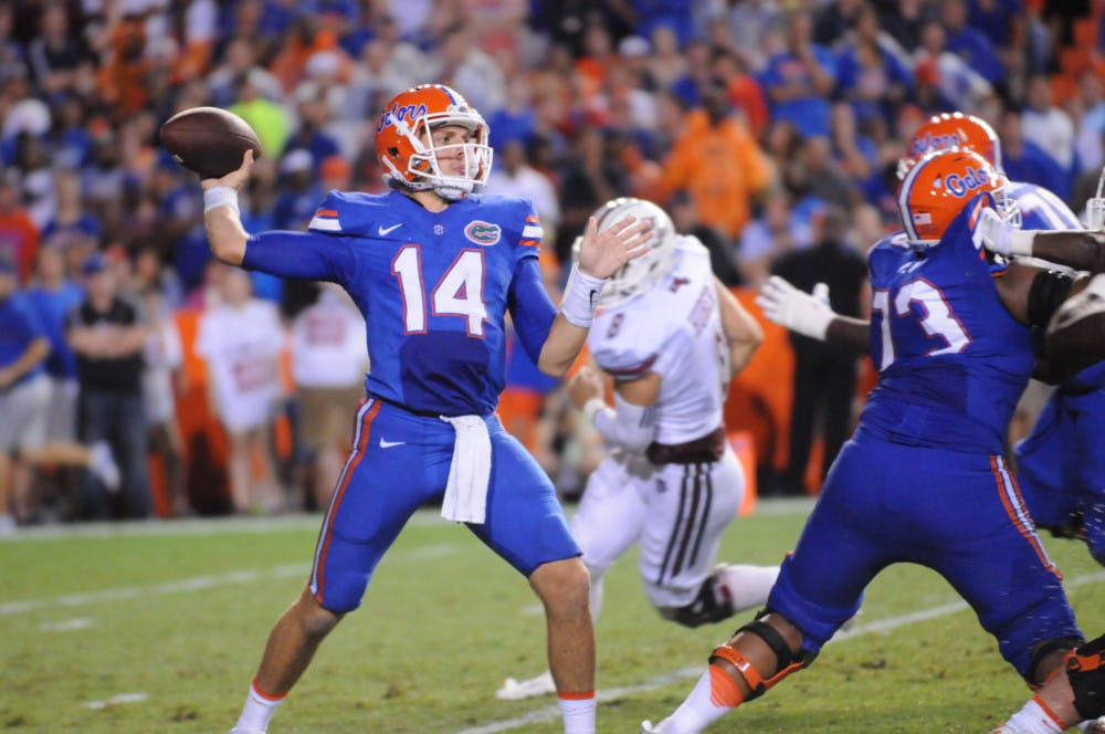 <p>Florida quarterback Luke Del Rio throws the ball during UF's 24-7 win over Massachusetts on Sept. 4, 2016, at Ben Hill Griffin Stadium.</p>