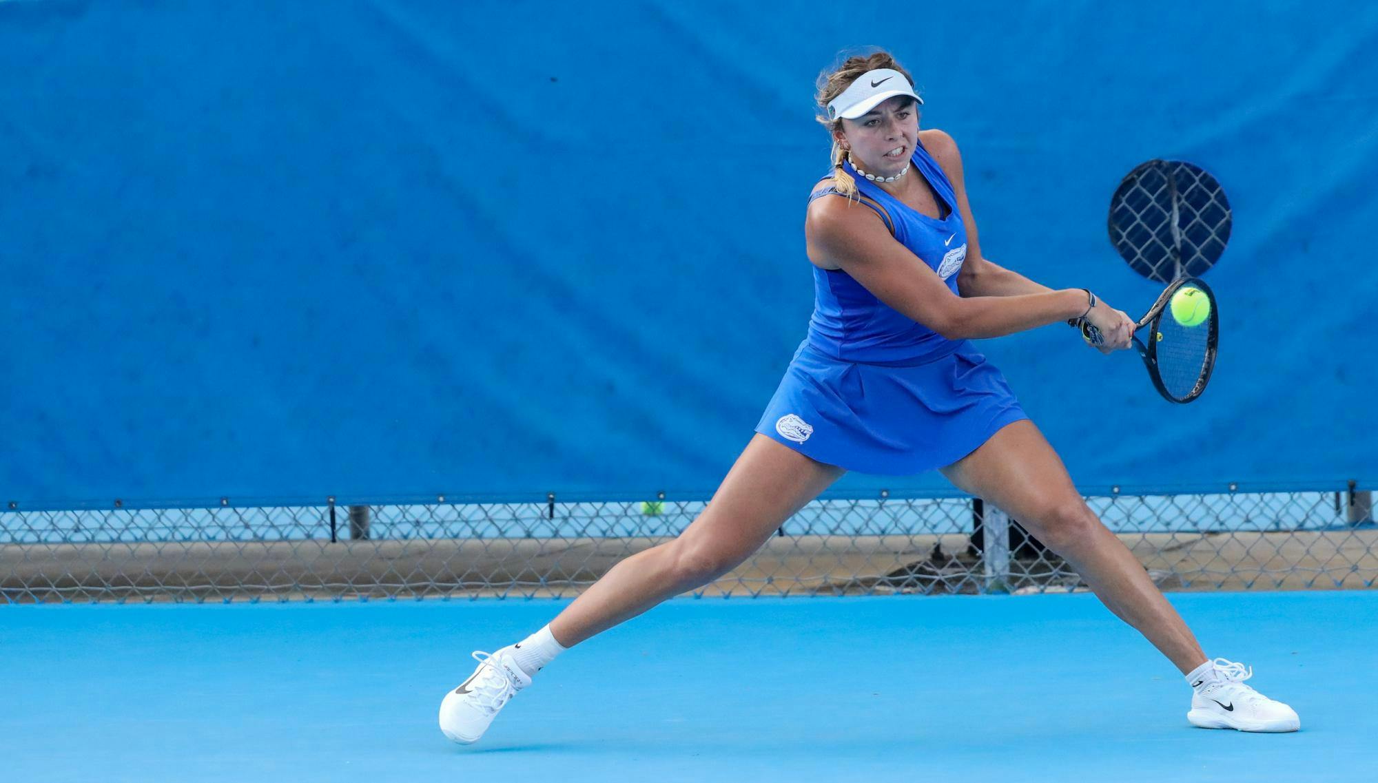 Florida’s Lucie Pawlak serves the ball during an NCAA women’s singles tennis match against Addison Bowman of Alabama, March 26, 2026, in Gainesville, Fla.