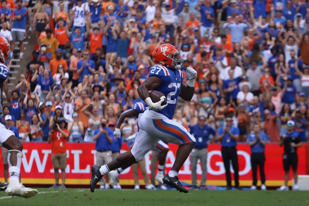 Florida's Dameon Pierce runs downfield away from Vanderbilt defenders during the Gators' 42-0 win on Oct. 9.